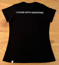 Load image into Gallery viewer, The back of the t-shirt is black with the words &quot;I STAND WITH SURVIVORS&quot; printed in white at the top.
